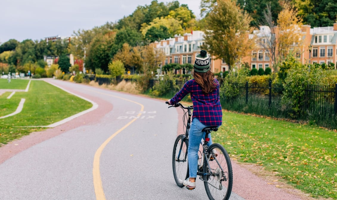 A person biking on a bike lane