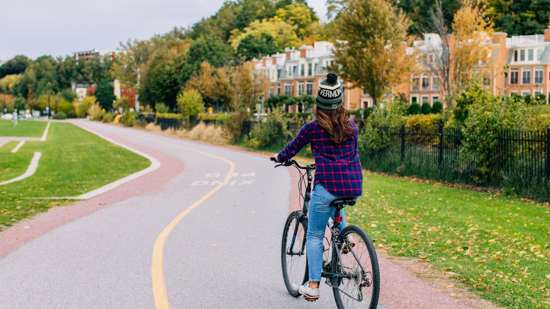 A person biking on a bike lane