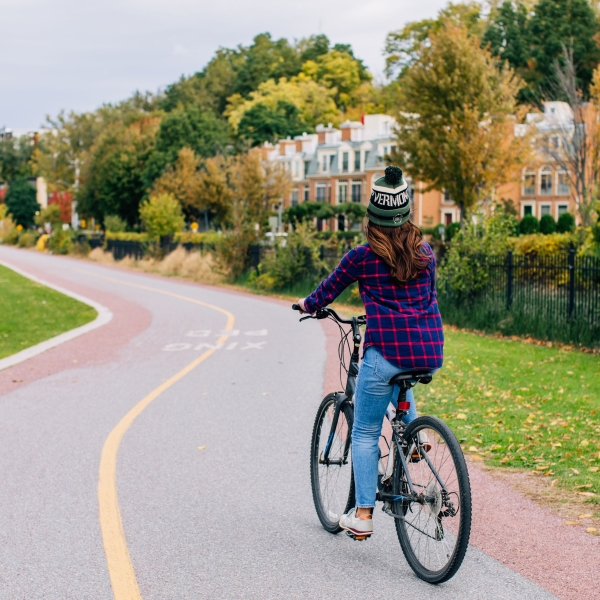 A person biking on a bike lane